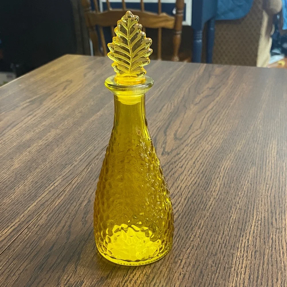 “5/$20” yellow apothecary glass bottle with plastic stopper
